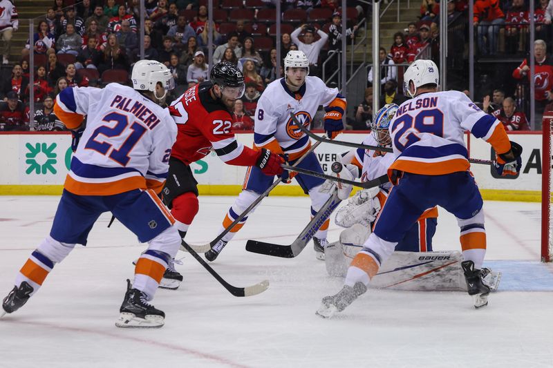 Oct 25, 2024; Newark, New Jersey, USA; New York Islanders goaltender Ilya Sorokin (30) makes a save on New Jersey Devils defenseman Brett Pesce (22) during overtime at Prudential Center. Mandatory Credit: Ed Mulholland-Imagn Images