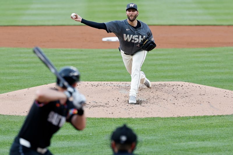 May 7, 2024; Washington, District of Columbia, USA; Washington Nationals starting pitcher Trevor Williams (32) pitches against Baltimore Orioles third baseman Jordan Westburg (11) during the second inning at Nationals Park. Mandatory Credit: Geoff Burke-USA TODAY Sports