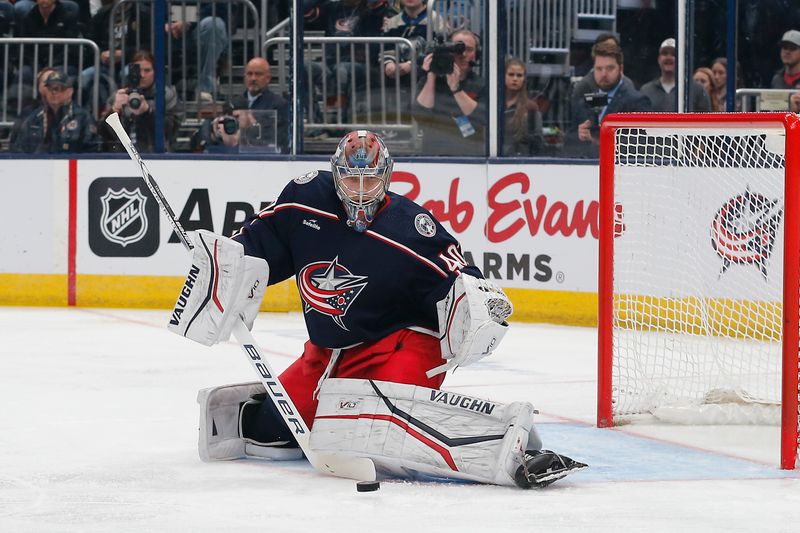 Mar 4, 2024; Columbus, Ohio, USA; Columbus Blue Jackets goalie Daniil Tarasov (40) makes a save against the Vegas Golden Knights during the first period at Nationwide Arena. Mandatory Credit: Russell LaBounty-USA TODAY Sports