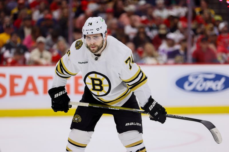 May 14, 2024; Sunrise, Florida, USA; Boston Bruins left wing Jake DeBrusk (74) looks on against the Florida Panthers during the first period in game five of the second round of the 2024 Stanley Cup Playoffs at Amerant Bank Arena. Mandatory Credit: Sam Navarro-USA TODAY Sports