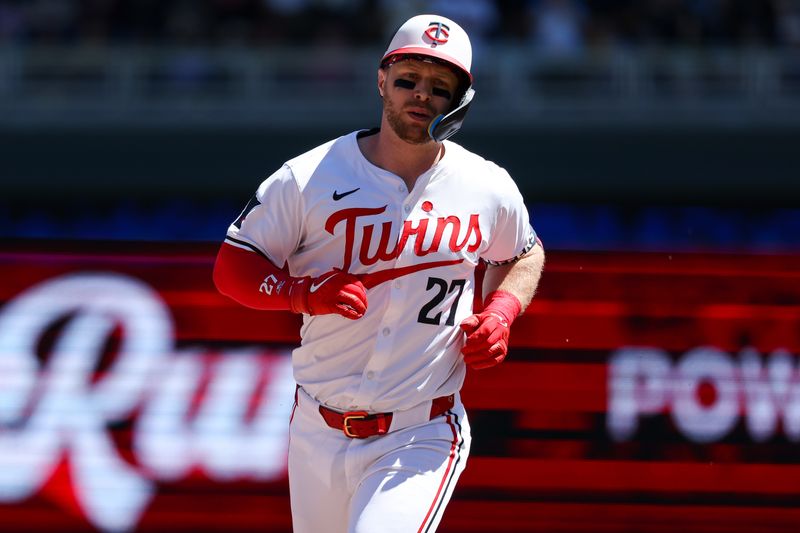 May 5, 2024; Minneapolis, Minnesota, USA; Minnesota Twins Ryan Jeffers (27) celebrates his home run against the Boston Red Sox during the third inning at Target Field. Mandatory Credit: Matt Krohn-USA TODAY Sports