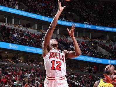 CHICAGO, IL - DECEMBER 28: Ayo Dosunmu #12 of the Chicago Bulls shoots the ball during the game against the Indiana Pacers on December 28, 2023 at United Center in Chicago, Illinois. NOTE TO USER: User expressly acknowledges and agrees that, by downloading and or using this photograph, User is consenting to the terms and conditions of the Getty Images License Agreement. Mandatory Copyright Notice: Copyright 2023 NBAE (Photo by Jeff Haynes/NBAE via Getty Images)