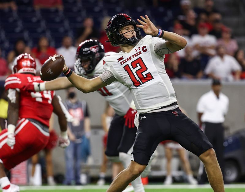 Sep 4, 2021; Houston, Texas, USA; Texas Tech Red Raiders quarterback Tyler Shough (12) attempts a pass during the fourth quarter against the Houston Cougars at NRG Stadium. Mandatory Credit: Troy Taormina-USA TODAY Sports