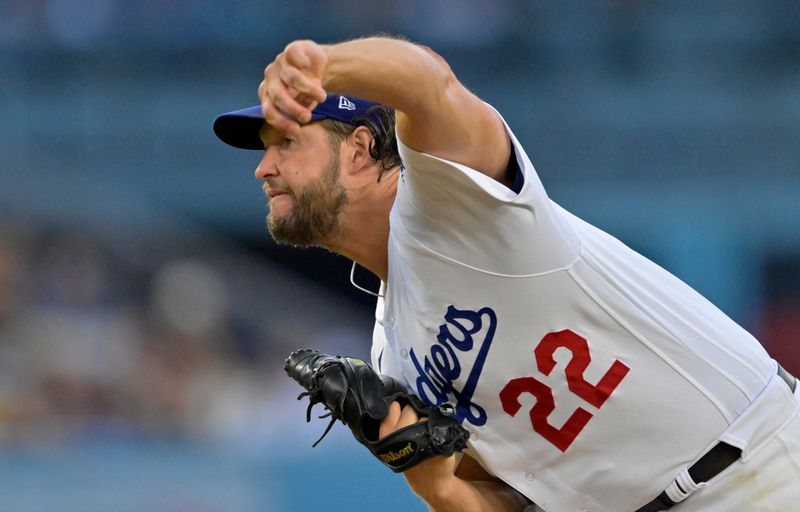 Aug 16, 2023; Los Angeles, California, USA;  Los Angeles Dodgers starting pitcher Clayton Kershaw (22) throws to the plate in the first inning against the Milwaukee Brewers at Dodger Stadium. Mandatory Credit: Jayne Kamin-Oncea-USA TODAY Sports