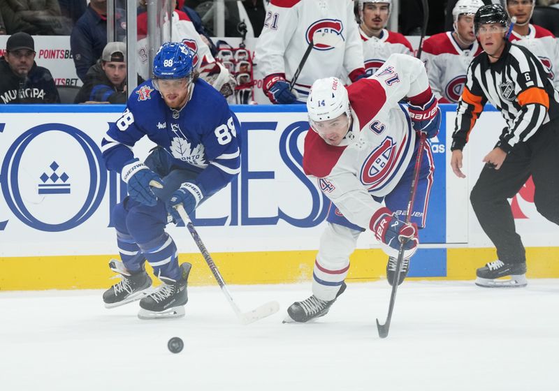 Oct 11, 2023; Toronto, Ontario, CAN; Toronto Maple Leafs right wing William Nylander (88) battles for the puck with Montreal Canadiens center Nick Suzuki (14) during the third period at Scotiabank Arena. Mandatory Credit: Nick Turchiaro-USA TODAY Sports