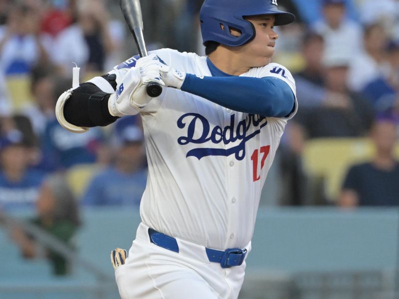 Aug 6, 2024; Los Angeles, California, USA;  Los Angeles Dodgers designated hitter Shohei Ohtani (17) grounds out in the first inning against the Philadelphia Phillies at Dodger Stadium. Mandatory Credit: Jayne Kamin-Oncea-USA TODAY Sports