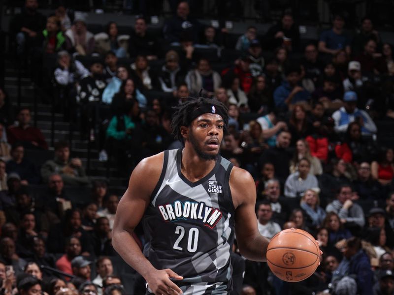 BROOKLYN, NY - FEBRUARY 10: Day'Ron Sharpe #20 of the Brooklyn Nets dribbles the ball during the game against the Charlotte Hornets on February 10, 2025 at Barclays Center in Brooklyn, New York. NOTE TO USER: User expressly acknowledges and agrees that, by downloading and or using this Photograph, user is consenting to the terms and conditions of the Getty Images License Agreement. Mandatory Copyright Notice: Copyright 2025 NBAE (Photo by Nathaniel S. Butler/NBAE via Getty Images)