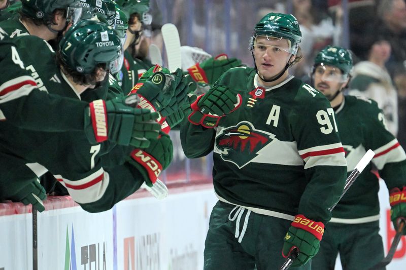 Apr 9, 2025; Saint Paul, Minnesota, USA;  Minnesota Wild forward Kiril Kaprizov (97) celebrates his power play goal against the San Jose Sharks during the second period at Xcel Energy Center. Mandatory Credit: Nick Wosika-Imagn Images