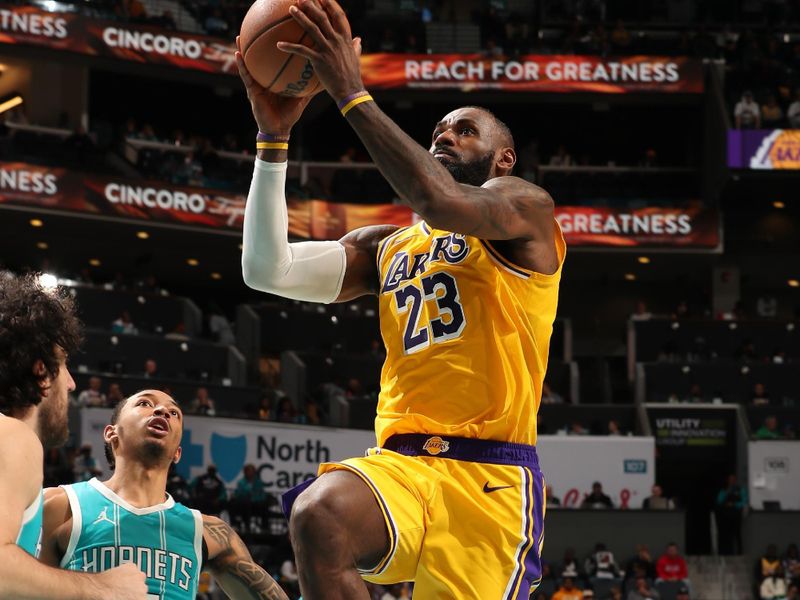 CHARLOTTE, NC - JANUARY 27:  LeBron James #23 of the Los Angeles Lakers shoots the ball during the game against the Charlotte Hornets on January 27, 2025 at Spectrum Center in Charlotte, North Carolina. NOTE TO USER: User expressly acknowledges and agrees that, by downloading and or using this photograph, User is consenting to the terms and conditions of the Getty Images License Agreement. Mandatory Copyright Notice: Copyright 2025 NBAE (Photo by Kent Smith/NBAE via Getty Images)