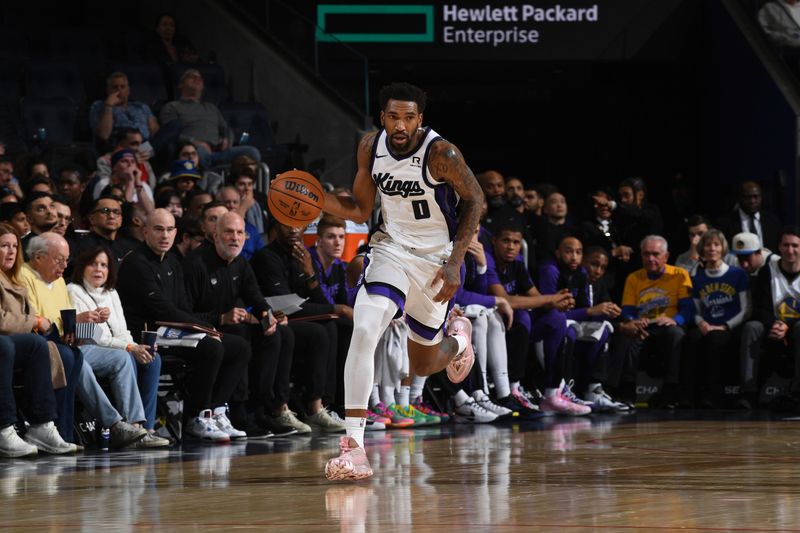 SAN FRANCISCO, CA - JANUARY 5:  Malik Monk #0 of the Sacramento Kings handles the ball during the game against the Golden State Warriors on January 5, 2025 at Chase Center in San Francisco, California. NOTE TO USER: User expressly acknowledges and agrees that, by downloading and or using this photograph, user is consenting to the terms and conditions of Getty Images License Agreement. Mandatory Copyright Notice: Copyright 2025 NBAE (Photo by Noah Graham/NBAE via Getty Images)