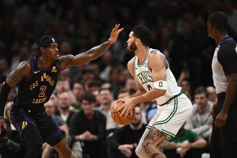 BOSTON, MASSACHUSETTS - FEBRUARY 01: Jarred Vanderbilt #2 of the Los Angeles Lakers defends Jayson Tatum #0 of the Boston Celtics during the first quarter at the TD Garden on February 01, 2024 in Boston, Massachusetts. NOTE TO USER: User expressly acknowledges and agrees that, by downloading and or using this photograph, User is consenting to the terms and conditions of the Getty Images License Agreement. (Photo by Brian Fluharty/Getty Images)