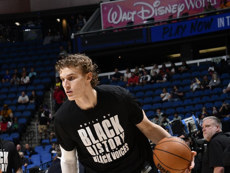 ORLANDO, FL - FEBRUARY 29: Lauri Markkanen #23 of the Utah Jazz warms up before the game against the Orlando Magic on February 29, 2024 at Amway Center in Orlando, Florida. NOTE TO USER: User expressly acknowledges and agrees that, by downloading and or using this photograph, User is consenting to the terms and conditions of the Getty Images License Agreement. Mandatory Copyright Notice: Copyright 2024 NBAE (Photo by Fernando Medina/NBAE via Getty Images)