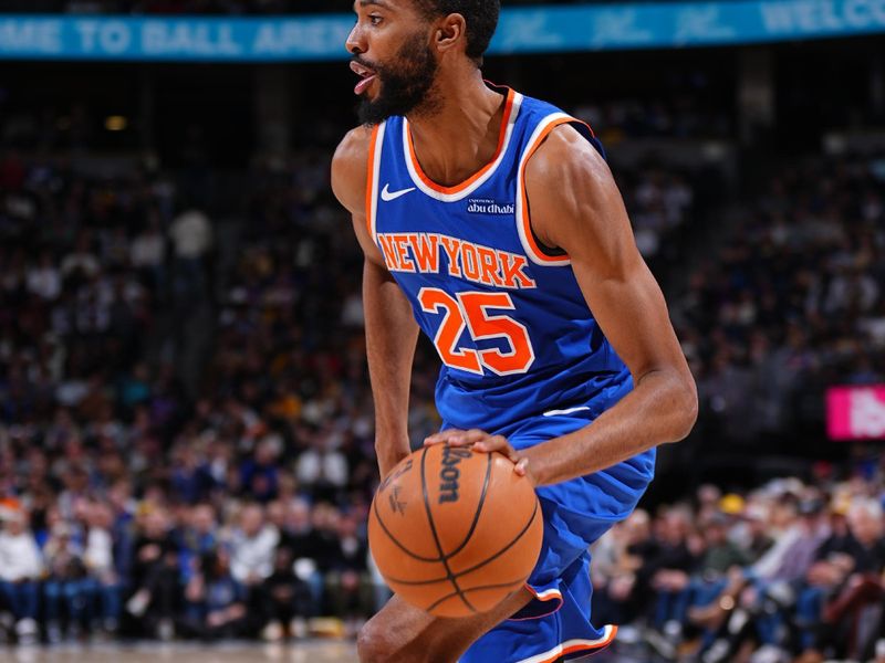 DENVER, CO - NOVEMBER 25: Mikal Bridges #25 of the New York Knicks dribbles the ball during the game against the Denver Nuggets on November 25, 2024 at Ball Arena in Denver, Colorado. NOTE TO USER: User expressly acknowledges and agrees that, by downloading and/or using this Photograph, user is consenting to the terms and conditions of the Getty Images License Agreement. Mandatory Copyright Notice: Copyright 2024 NBAE (Photo by Garrett Ellwood/NBAE via Getty Images)