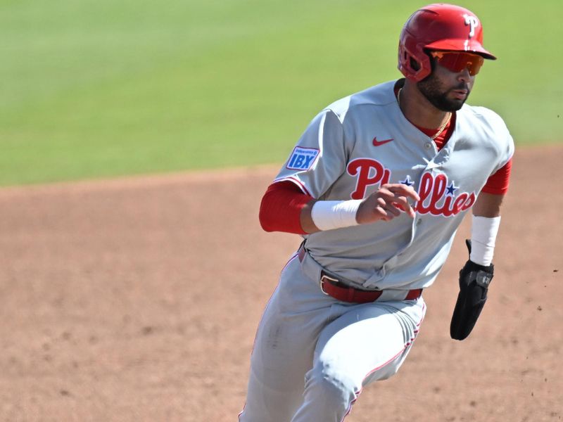 Feb 28, 2026; Dunedin, Florida, USA; Philadelphia Phillies center fielder Justin Crawford (80) rounds third base on his way to scoring a run in the third inning against the Toronto Blue Jays during spring training at TD Ballpark. Mandatory Credit: Jonathan Dyer-Imagn Images