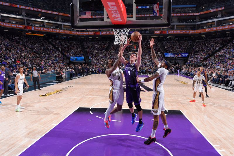 SACRAMENTO, CA - JANUARY 7:  Kevin Huerter #9 of the Sacramento Kings goes to the basket during the game on January 7, 2024 at Golden 1 Center in Sacramento, California. NOTE TO USER: User expressly acknowledges and agrees that, by downloading and or using this Photograph, user is consenting to the terms and conditions of the Getty Images License Agreement. Mandatory Copyright Notice: Copyright 2024 NBAE (Photo by Rocky Widner/NBAE via Getty Images)