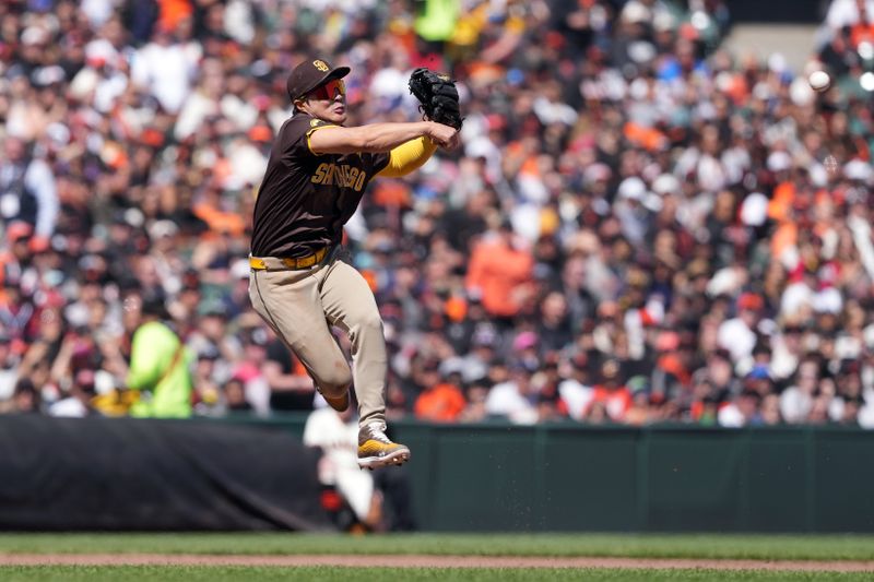 Apr 7, 2024; San Francisco, California, USA; San Diego Padres shortstop Ha-Seong Kim (7) throws the ball to second base to record an out against the San Francisco Giants during the sixth inning at Oracle Park. Mandatory Credit: Darren Yamashita-USA TODAY Sports