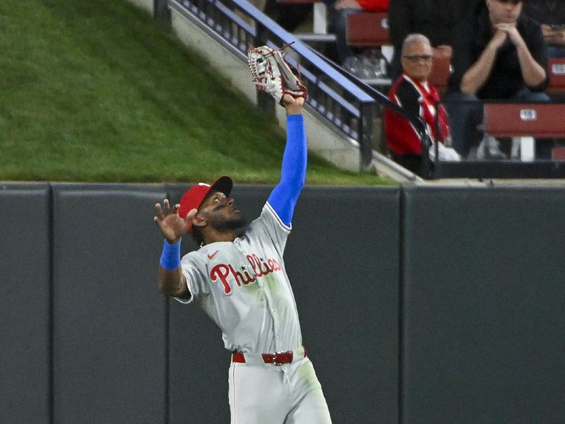 Apr 8, 2024; St. Louis, Missouri, USA;  Philadelphia Phillies center fielder Johan Rojas (18) leaps to catch a line drive against the St. Louis Cardinals during the fourth inning at Busch Stadium. Mandatory Credit: Jeff Curry-USA TODAY Sports