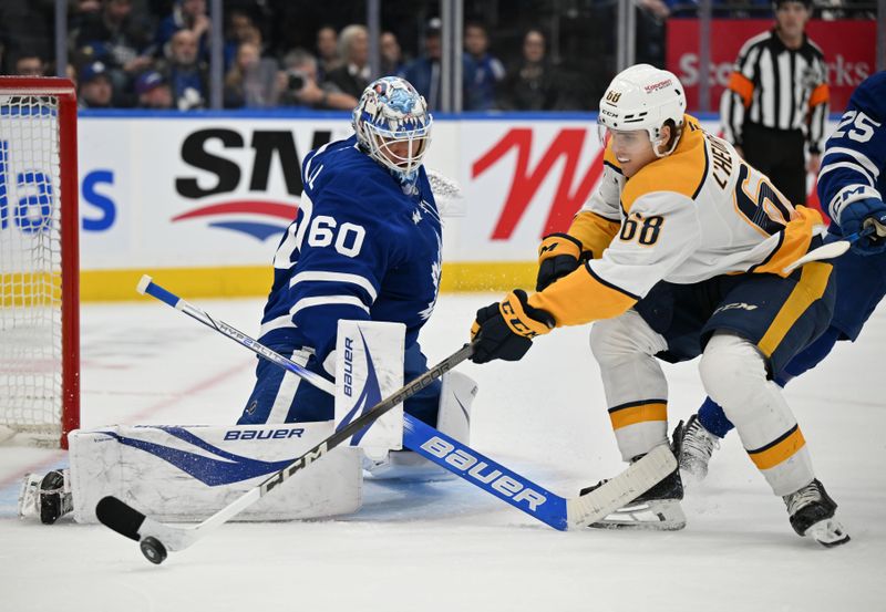 Dec 4, 2024; Toronto, Ontario, CAN;  Toronto Maple Leafs goalie Joseph Woll (60) makes a save against Nashville Predators forward Zachary L'Heureux (68) in the second period at Scotiabank Arena. Mandatory Credit: Dan Hamilton-Imagn Images