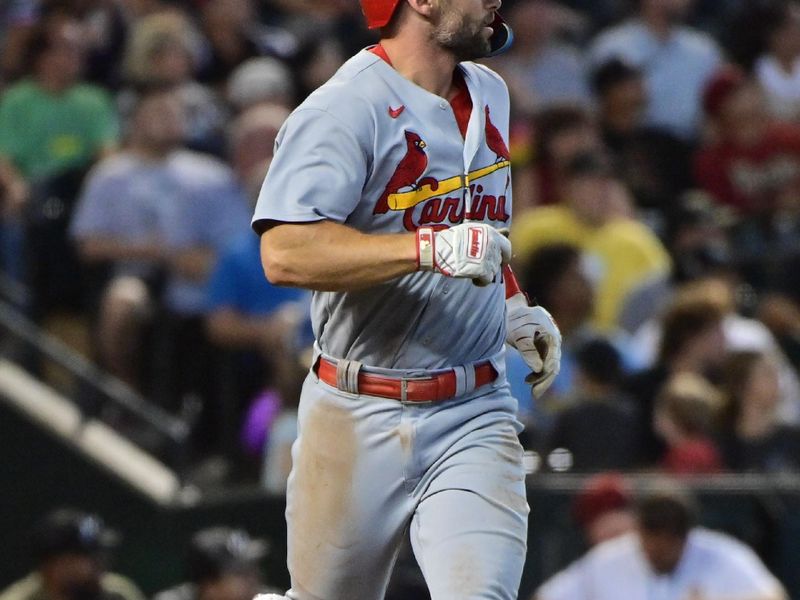 Jul 26, 2023; Phoenix, Arizona, USA;  St. Louis Cardinals first baseman Paul Goldschmidt (46) hits a two run home run in the seventh inning against the Arizona Diamondbacks at Chase Field. Mandatory Credit: Matt Kartozian-USA TODAY Sports