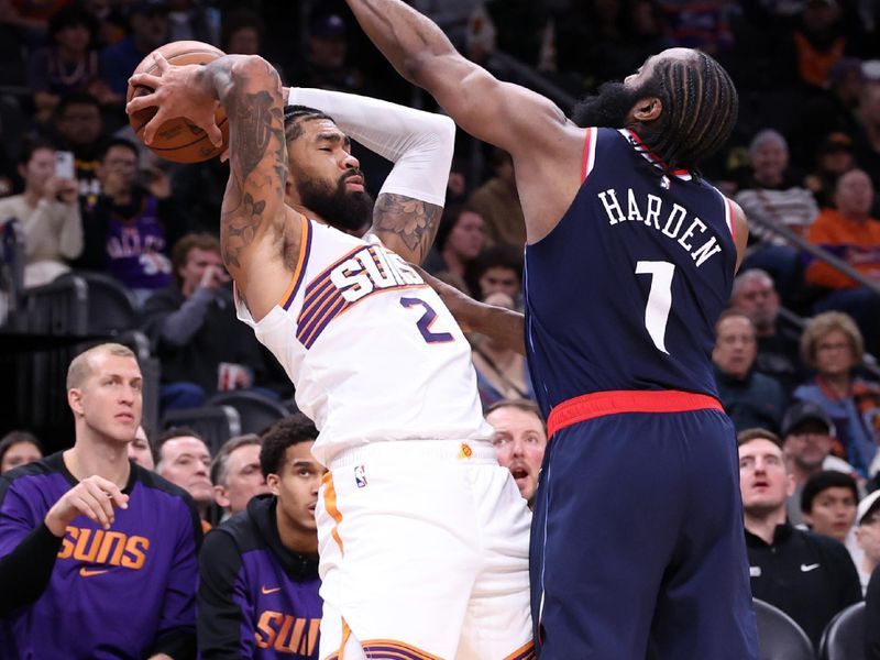 PHOENIX, ARIZONA - JANUARY 27: James Harden #1 of the LA Clippers pressures Nick Richards #2 of the Phoenix Suns during the second half at Footprint Center on January 27, 2025 in Phoenix, Arizona. NOTE TO USER: User expressly acknowledges and agrees that, by downloading and or using this photograph, User is consenting to the terms and conditions of the Getty Images License Agreement.  (Photo by Chris Coduto/Getty Images)