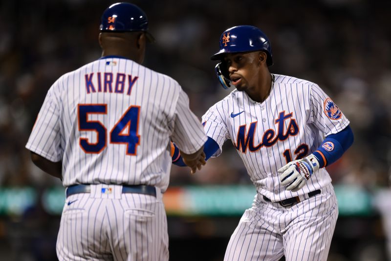 Aug 9, 2023; New York City, New York, USA; New York Mets shortstop Francisco Lindor (12) reacts after hitting a single against the Chicago Cubs during the fourth inning at Citi Field. Mandatory Credit: John Jones-USA TODAY Sports