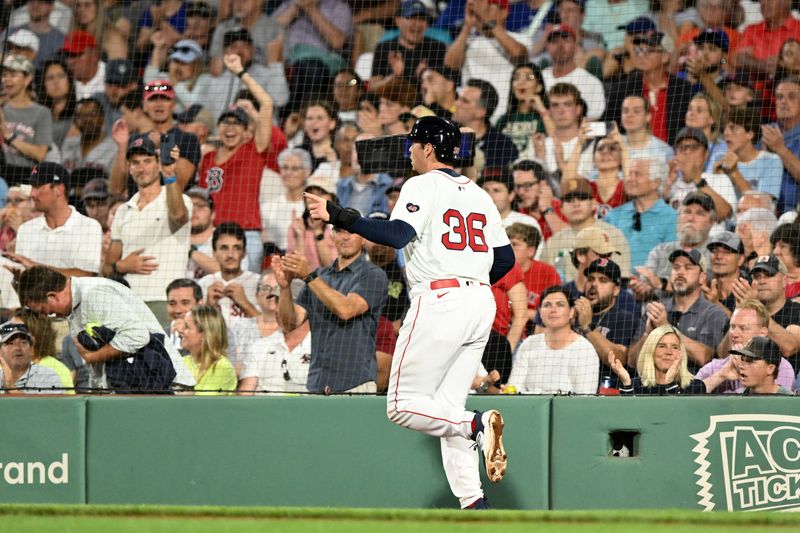 Aug 27, 2024; Boston, Massachusetts, USA; Boston Red Sox first baseman Triston Casas (36) runs off of the field after scoring a run against the Toronto Blue Jays during the fifth inning at Fenway Park. Mandatory Credit: Brian Fluharty-USA TODAY Sports