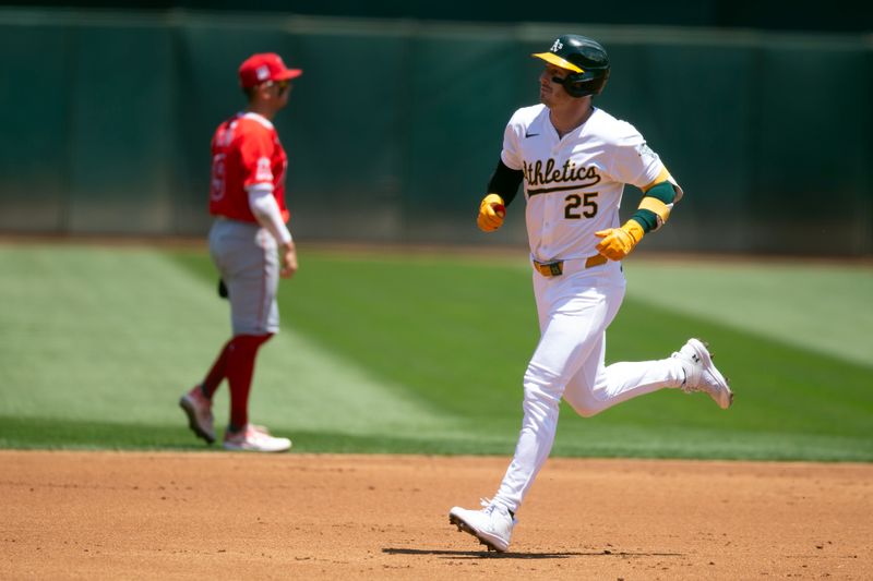 Jul 20, 2024; Oakland, California, USA; Oakland Athletics designated hitter Brent Rooker (25) runs out his three-run home run against the Los Angeles Angels during the first inning at Oakland-Alameda County Coliseum. Mandatory Credit: D. Ross Cameron-USA TODAY Sports