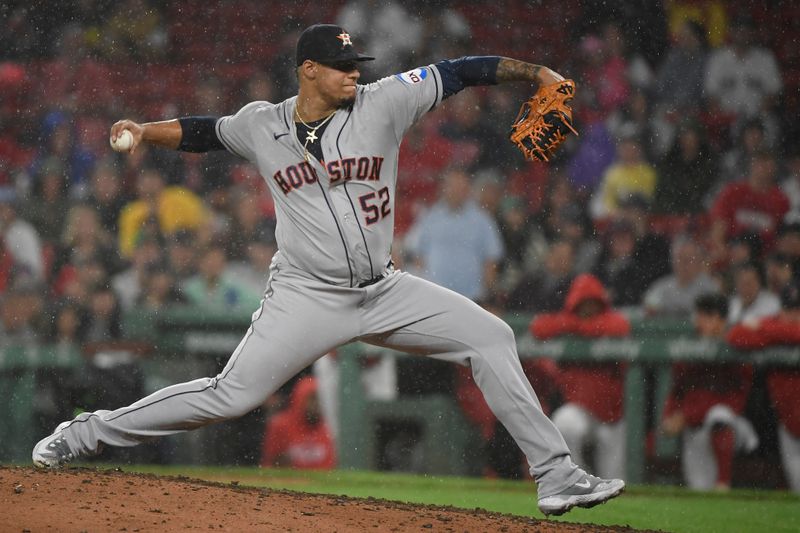 Aug 29, 2023; Boston, Massachusetts, USA;  Houston Astros relief pitcher Bryan Abreu (52) pitches during the ninth inning against the Boston Red Sox at Fenway Park. Mandatory Credit: Bob DeChiara-USA TODAY Sports