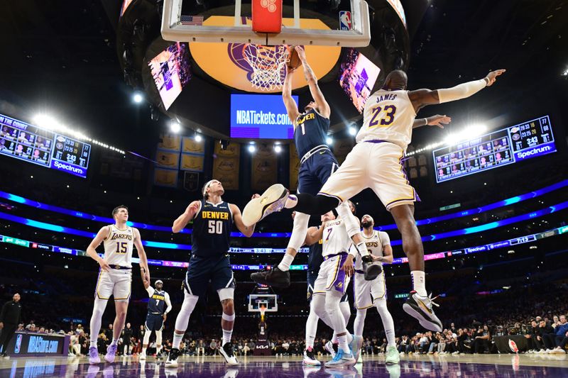 LOS ANGELES, CA - APRIL 27: Michael Porter Jr. #1 of the Denver Nuggets dunks the ball during the game against the Los Angeles Lakers during Round 1 Game 4 of the 2024 NBA Playoffs on April 27, 2024 at Crypto.Com Arena in Los Angeles, California. NOTE TO USER: User expressly acknowledges and agrees that, by downloading and/or using this Photograph, user is consenting to the terms and conditions of the Getty Images License Agreement. Mandatory Copyright Notice: Copyright 2024 NBAE (Photo by Adam Pantozzi/NBAE via Getty Images)