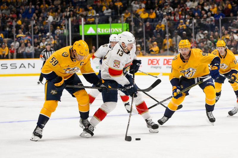 Feb 25, 2025; Nashville, Tennessee, USA;  Florida Panthers center Sam Reinhart (13) splits Nashville Predators defenseman Roman Josi (59) and center Steven Stamkos (91) during the second period at Bridgestone Arena. Mandatory Credit: Steve Roberts-Imagn Images