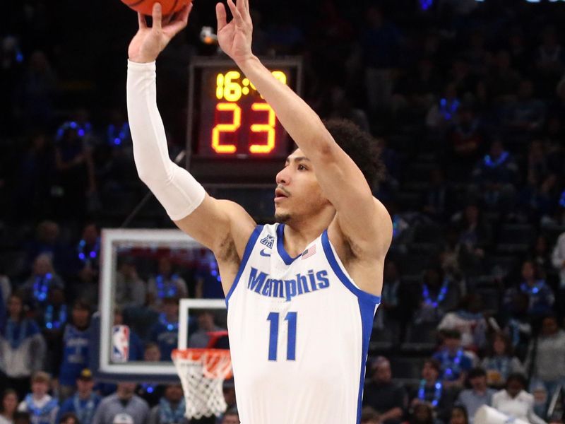 Feb 11, 2024; Memphis, Tennessee, USA; Memphis Tigers guard Jahvon Quinerly (11) shoots for three during the first half against the Tulane Green Wave at FedExForum. Mandatory Credit: Petre Thomas-USA TODAY Sports