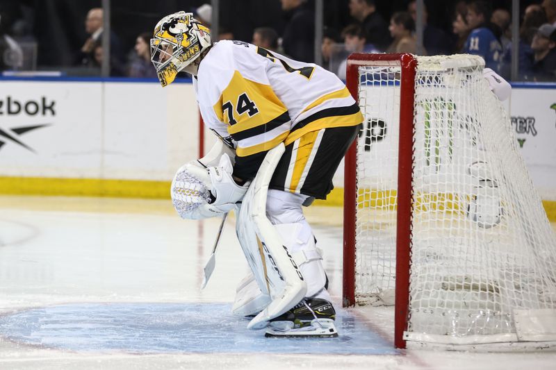 Feb 28, 2026; New York, New York, USA;  Pittsburgh Penguins goaltender Stuart Skinner (74) gets ready for the start of the second period against the New York Rangers at Madison Square Garden. Mandatory Credit: Wendell Cruz-Imagn Images