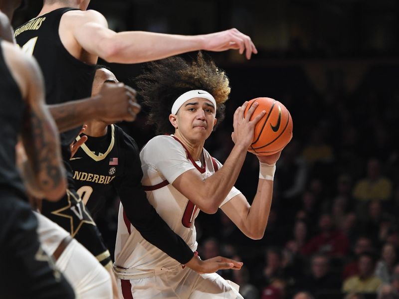 Jan 14, 2023; Nashville, Tennessee, USA; Arkansas Razorbacks guard Anthony Black (0) drives to the basket during the second half against the Vanderbilt Commodores at Memorial Gymnasium. Mandatory Credit: Christopher Hanewinckel-USA TODAY Sports