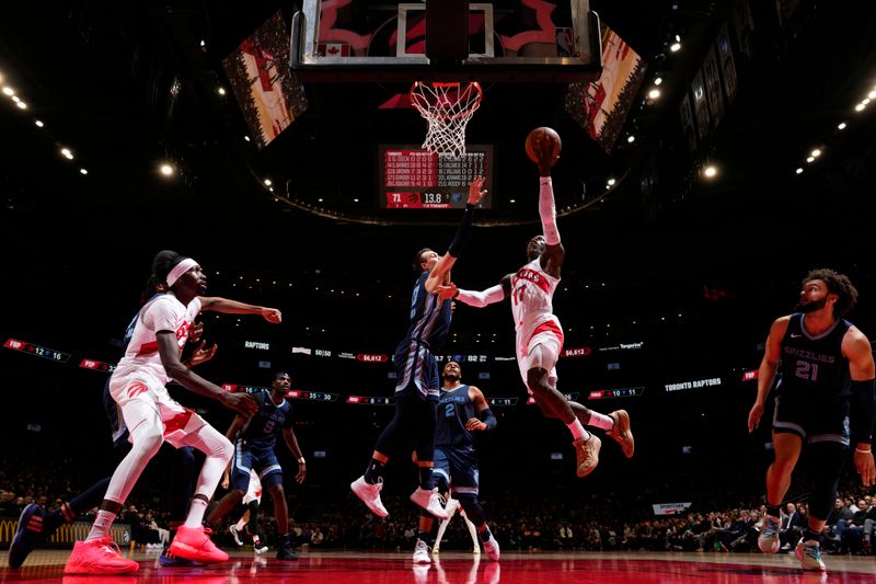 TORONTO, CANADA - JANUARY 22: Dennis Schroder #17 of the Toronto Raptors drives to the basket during the game against the Memphis Grizzlies on January 22, 2024 at the Scotiabank Arena in Toronto, Ontario, Canada.  NOTE TO USER: User expressly acknowledges and agrees that, by downloading and or using this Photograph, user is consenting to the terms and conditions of the Getty Images License Agreement.  Mandatory Copyright Notice: Copyright 2024 NBAE (Photo by Mark Blinch/NBAE via Getty Images)