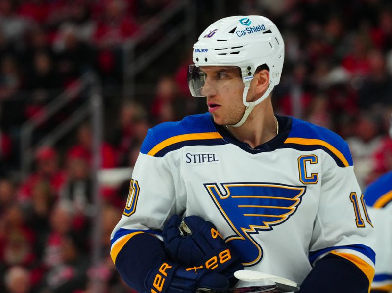 Jan 6, 2024; Raleigh, North Carolina, USA; St. Louis Blues center Brayden Schenn (10) looks on against the Carolina Hurricanes during the first period at PNC Arena. Mandatory Credit: James Guillory-USA TODAY Sports