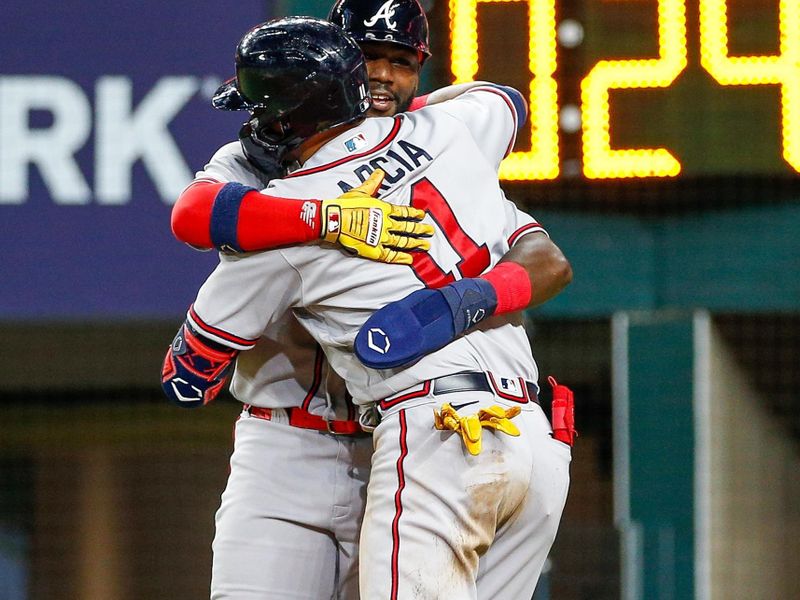 May 15, 2023; Arlington, Texas, USA; Atlanta Braves shortstop Orlando Arcia (11) hits a two-run home run during the sixth inning against the Texas Rangers at Globe Life Field. Mandatory Credit: Andrew Dieb-USA TODAY Sports