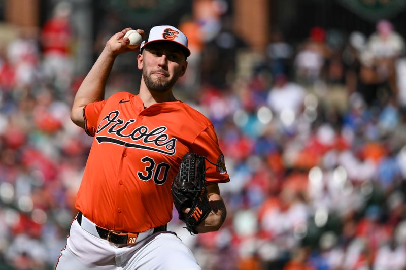 Jun 15, 2024; Baltimore, Maryland, USA;  Baltimore Orioles pitcher Grayson Rodriguez (30) throws a second inning pitch against the Philadelphia Phillies at Oriole Park at Camden Yards. Mandatory Credit: Tommy Gilligan-USA TODAY Sports