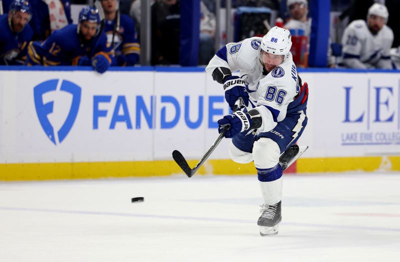 Jan 20, 2024; Buffalo, New York, USA;  Tampa Bay Lightning right wing Nikita Kucherov (86) takes a shot on goal during the first period against the Buffalo Sabres at KeyBank Center. Mandatory Credit: Timothy T. Ludwig-USA TODAY Sports