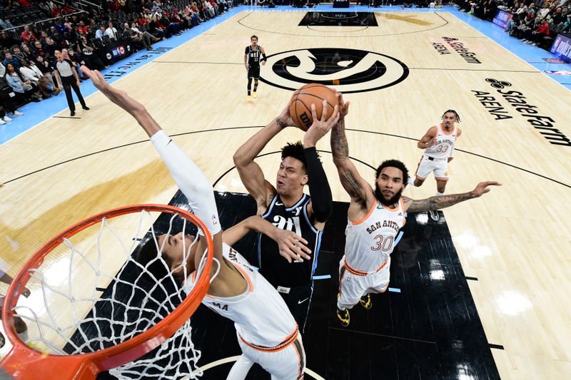 ATLANTA, GA - JANUARY 15: Jalen Johnson #1 of the Atlanta Hawks drives to the basket during the game against the San Antonio Spurs on January 15, 2024 at State Farm Arena in Atlanta, Georgia.  NOTE TO USER: User expressly acknowledges and agrees that, by downloading and/or using this Photograph, user is consenting to the terms and conditions of the Getty Images License Agreement. Mandatory Copyright Notice: Copyright 2024 NBAE (Photo by Adam Hagy/NBAE via Getty Images)