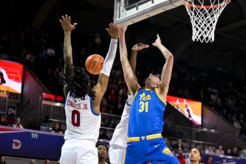 Feb 11, 2025; Dallas, Texas, USA; Pittsburgh Panthers forward Jorge Diaz Graham (31) and Southern Methodist Mustangs guard B.J. Edwards (0) battle for the rebound during the first half at Moody Coliseum. Mandatory Credit: Jerome Miron-Imagn Images