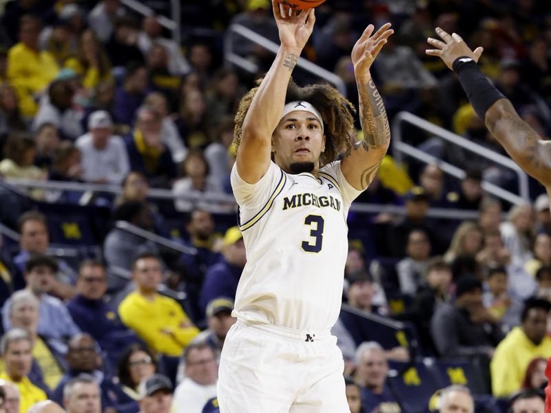 Feb 27, 2025; Ann Arbor, Michigan, USA;  Michigan Wolverines guard Tre Donaldson (3) shoots in the first half against the Rutgers Scarlet Knights at Crisler Center. Mandatory Credit: Rick Osentoski-Imagn Images