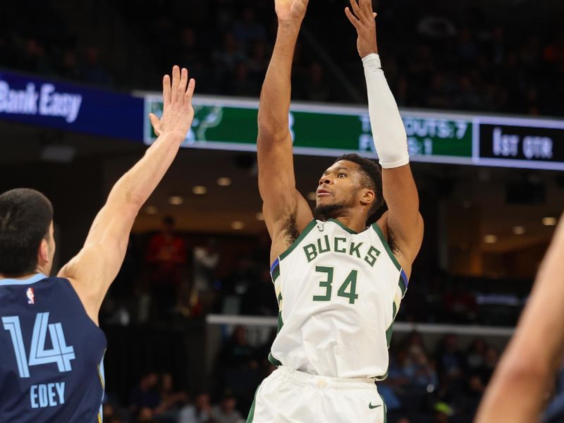 MEMPHIS, TENNESSEE - OCTOBER 31: Giannis Antetokounmpo #34 of the Milwaukee Bucks shoots the ball over Zach Edey #14 of the Memphis Grizzlies during the first quarter  at FedExForum on October 31, 2024 in Memphis, Tennessee. NOTE TO USER: User expressly acknowledges and agrees that, by downloading and or using this Photograph, user is consenting to the terms and conditions of the Getty Images License Agreement. (Photo by Wes Hale/Getty Images)