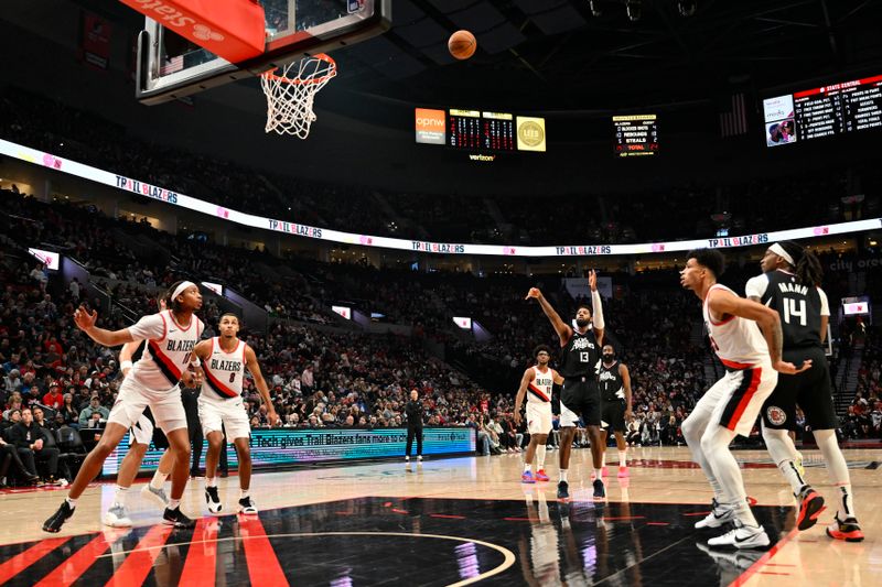 PORTLAND, OREGON - MARCH 22: Paul George #13 of the LA Clippers shoots a free throw during the second quarter of the game against the Portland Trail Blazers at the Moda Center on March 22, 2024 in Portland, Oregon. The LA Clippers won 125-117. NOTE TO USER: User expressly acknowledges and agrees that, by downloading and or using this photograph, User is consenting to the terms and conditions of the Getty Images License Agreement. (Photo by Alika Jenner/Getty Images)
