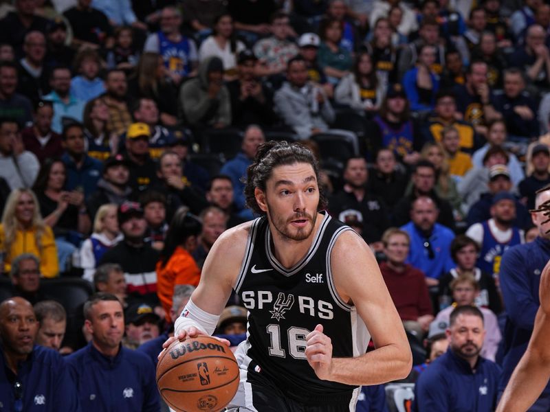 DENVER, CO - APRIL 2: Cedi Osman #16 of the San Antonio Spurs handles the ball during the game against the Denver Nuggets on April 2, 2024 at the Ball Arena in Denver, Colorado. NOTE TO USER: User expressly acknowledges and agrees that, by downloading and/or using this Photograph, user is consenting to the terms and conditions of the Getty Images License Agreement. Mandatory Copyright Notice: Copyright 2024 NBAE (Photo by Garrett Ellwood/NBAE via Getty Images)