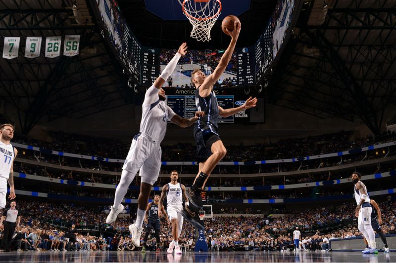 DALLAS, TX - NOVEMBER 3: Franz Wagner #22 of the Orlando Magic shoots the ball during the game against the Dallas Mavericks on November 3, 2024 at American Airlines Center in Dallas, Texas. NOTE TO USER: User expressly acknowledges and agrees that, by downloading and or using this photograph, User is consenting to the terms and conditions of the Getty Images License Agreement. Mandatory Copyright Notice: Copyright 2024 NBAE (Photo by Glenn James/NBAE via Getty Images)