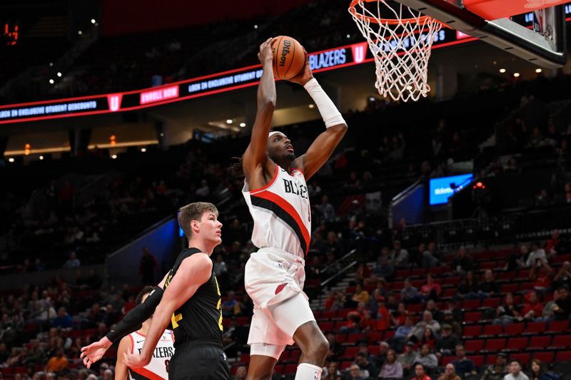 PORTLAND, OREGON - OCTOBER 18: Jerami Grant #9 of the Portland Trail Blazers attempts to dunks the ball during the third quarter of the preseason game against the Utah Jazz at Moda Center on October 18, 2024 in Portland, Oregon. NOTE TO USER: User expressly acknowledges and agrees that, by downloading and or using this photograph, User is consenting to the terms and conditions of the Getty Images License Agreement. (Photo by Alika Jenner/Getty Images)