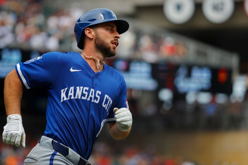 Aug 14, 2024; Minneapolis, Minnesota, USA; Kansas City Royals third baseman Paul DeJong runs the bases after hitting a solo home run against the Minnesota Twins in the sixth inning at Target Field. Mandatory Credit: Bruce Kluckhohn-USA TODAY Sports