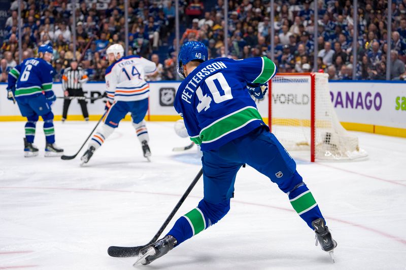 May 10, 2024; Vancouver, British Columbia, CAN; Vancouver Canucks forward Elias Pettersson (40) scores on this shot against the Edmonton Oilers during the first period in game two of the second round of the 2024 Stanley Cup Playoffs at Rogers Arena. Mandatory Credit: Bob Frid-USA TODAY Sports