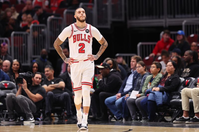 CHICAGO, ILLINOIS - OCTOBER 18: Lonzo Ball #2 of the Chicago Bulls looks on against the Cleveland Cavaliers during the first half of a preseason game at the United Center on October 18, 2024 in Chicago, Illinois. NOTE TO USER: User expressly acknowledges and agrees that, by downloading and or using this photograph, User is consenting to the terms and conditions of the Getty Images License Agreement.  (Photo by Michael Reaves/Getty Images)