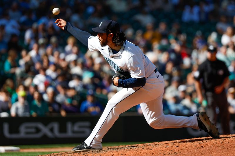 Aug 28, 2024; Seattle, Washington, USA; Seattle Mariners relief pitcher Andres Munoz (75) throws against the Tampa Bay Rays during the ninth inning at T-Mobile Park. Mandatory Credit: Joe Nicholson-USA TODAY Sports